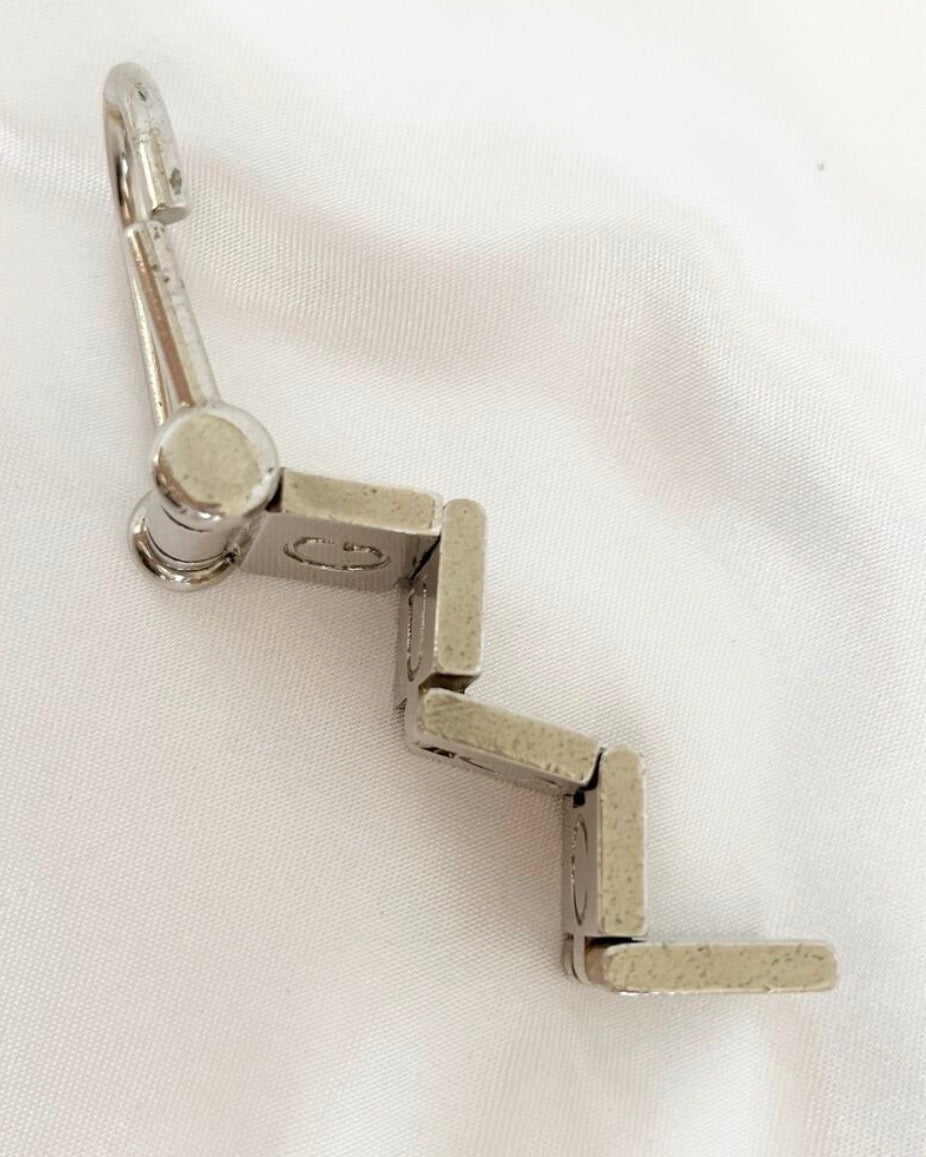 Vintage 1990s Gucci Articulated GUCCI Logo Keychain Silver Tone Made in Italy Rare
