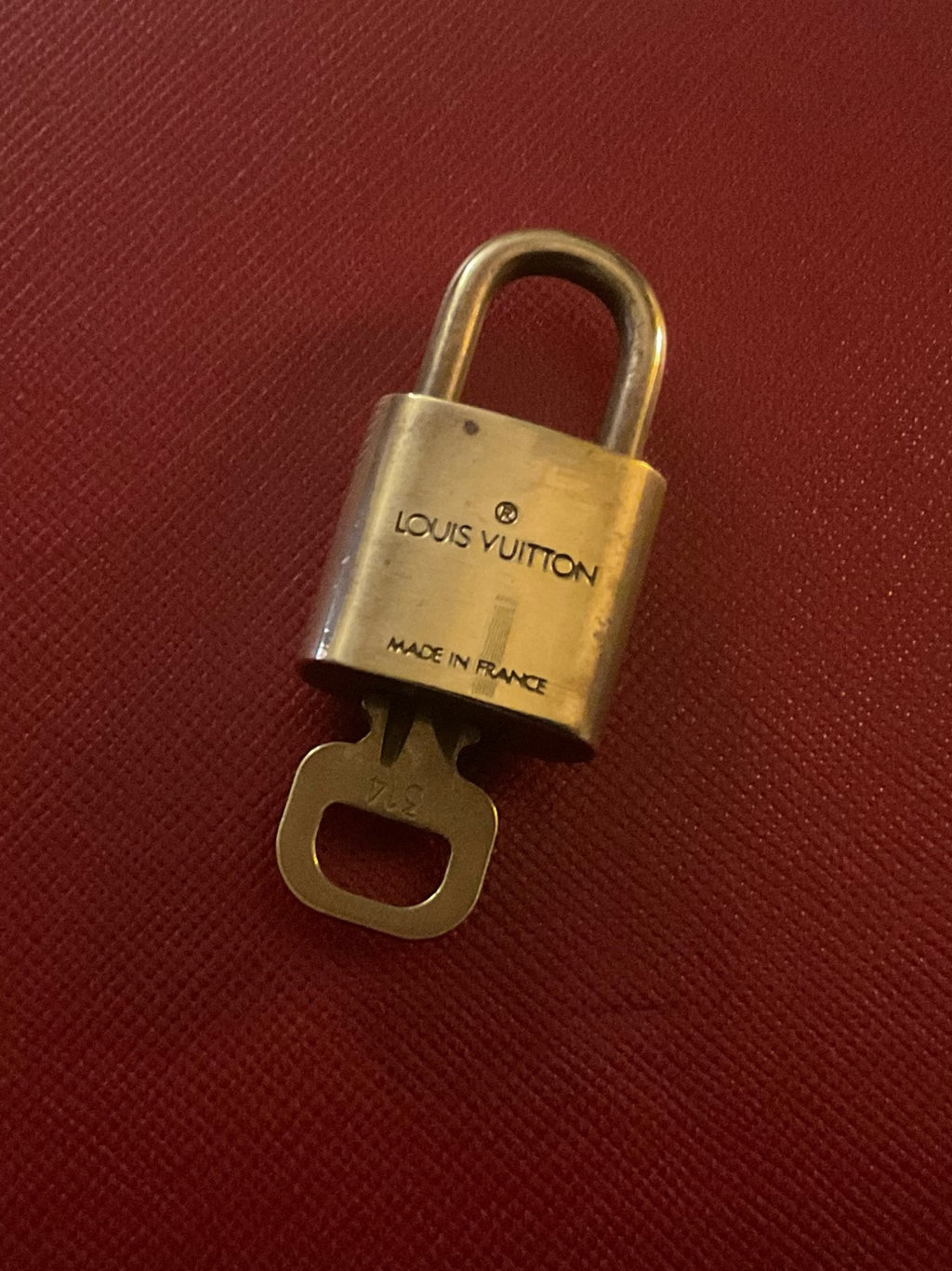 Louis Vuitton brass padlock