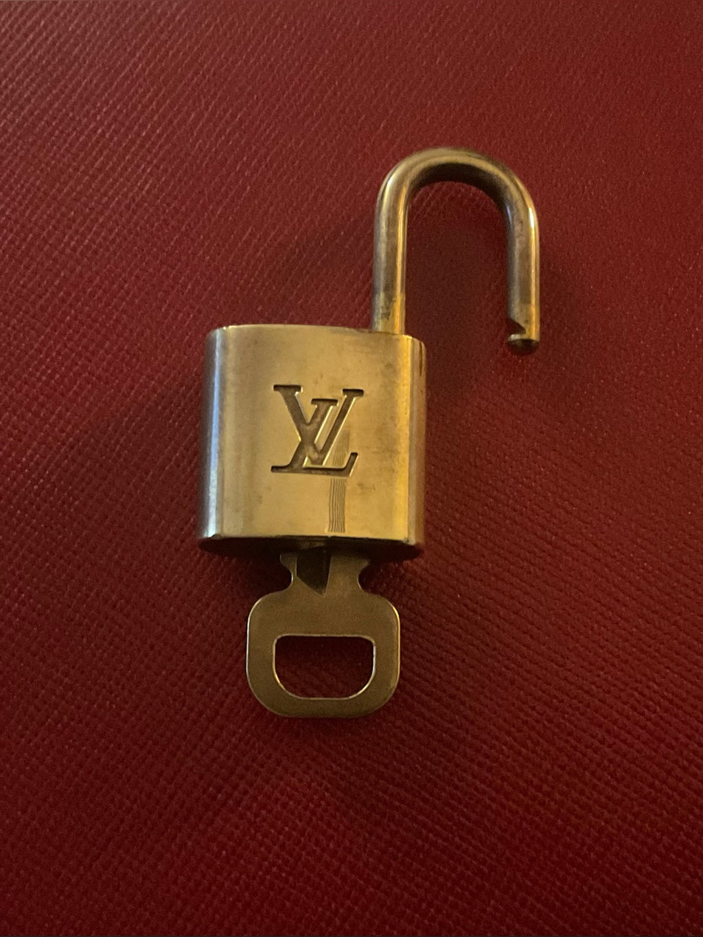 Louis Vuitton brass padlock