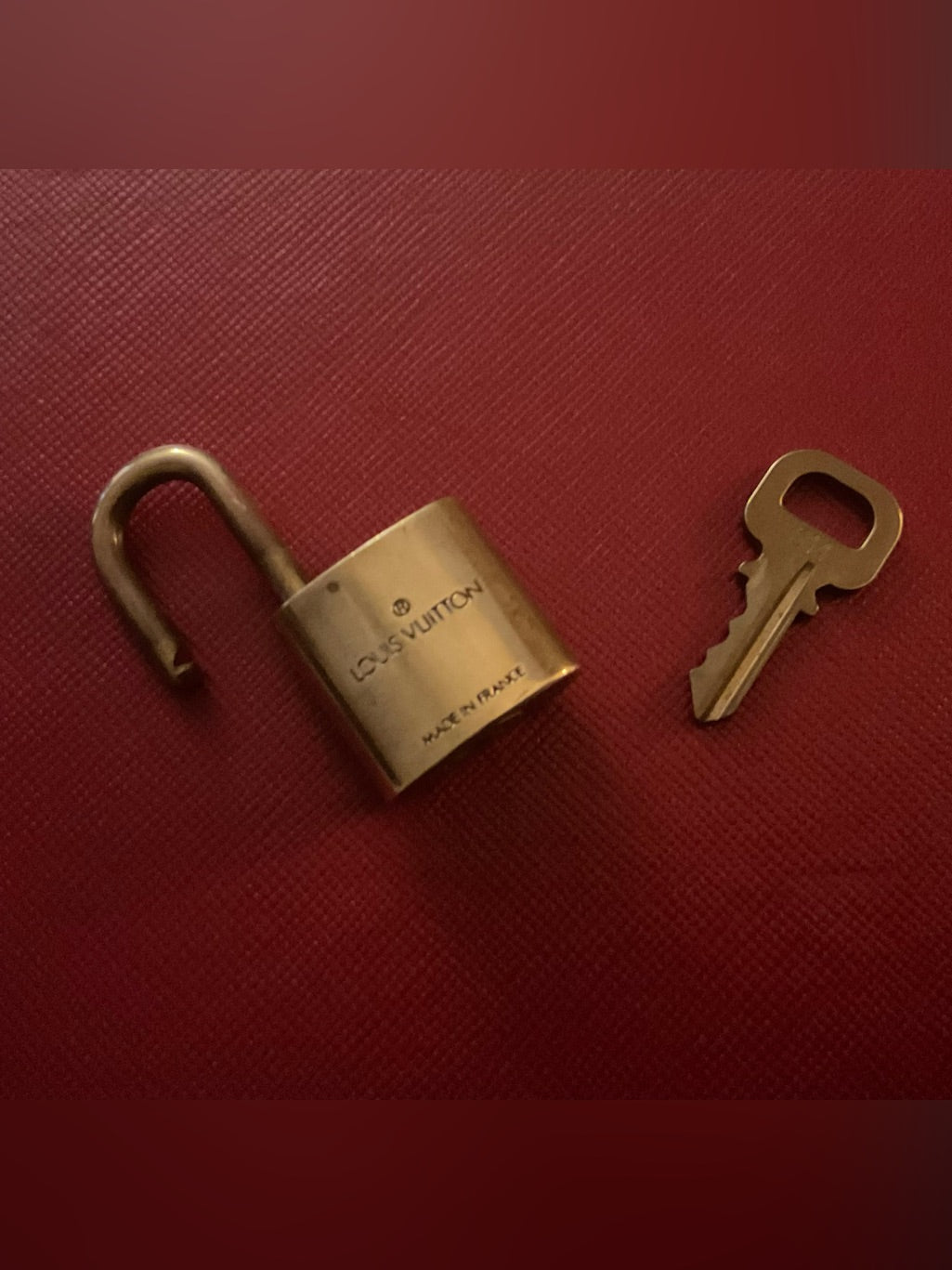 Louis Vuitton brass padlock