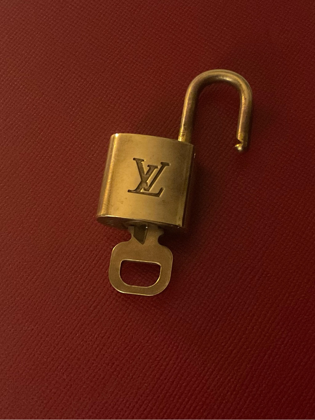 Louis Vuitton brass padlock