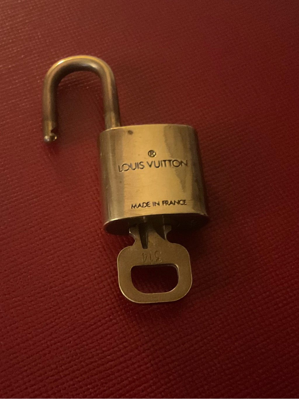 Louis Vuitton brass padlock