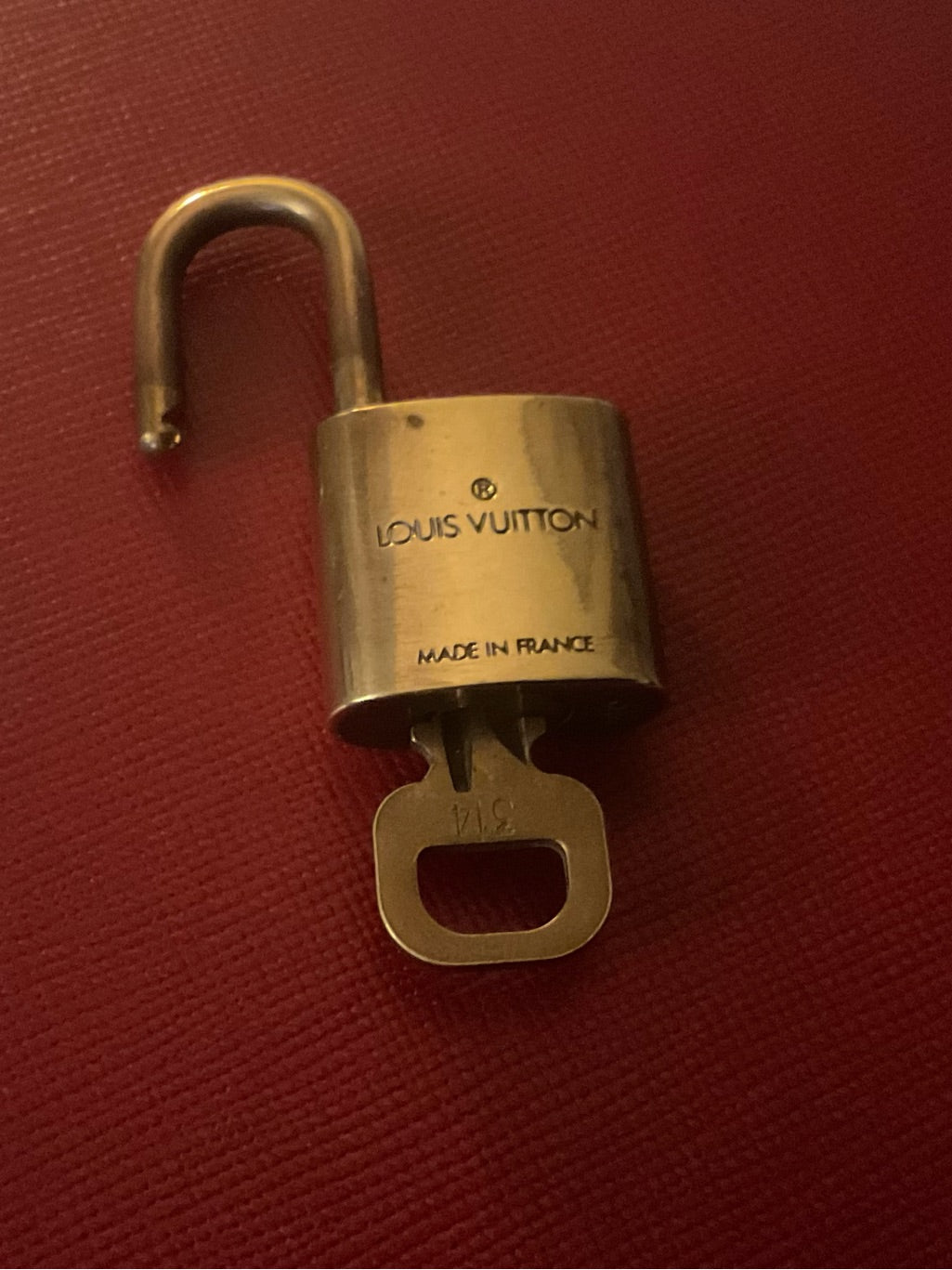 Louis Vuitton brass padlock