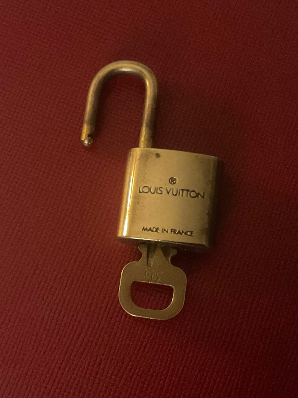 Louis Vuitton brass padlock