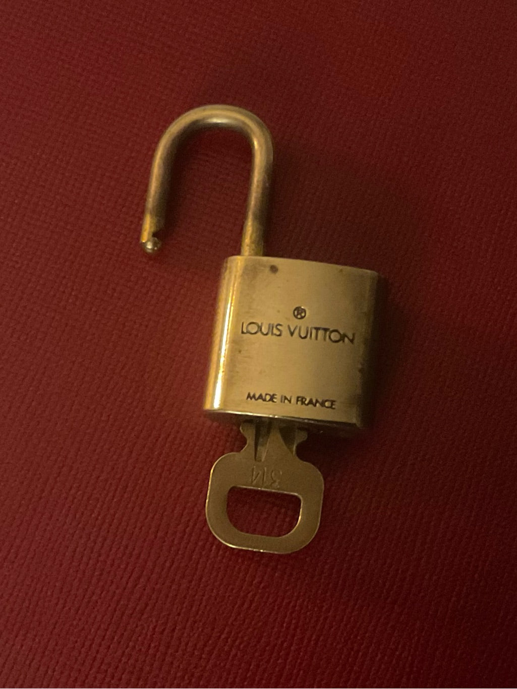 Louis Vuitton brass padlock