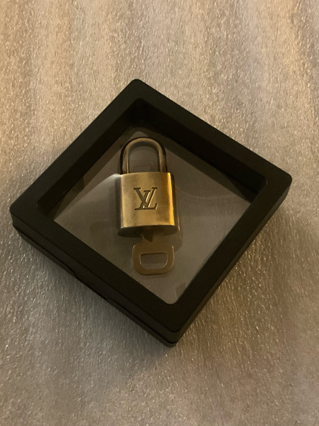 Louis Vuitton brass padlock