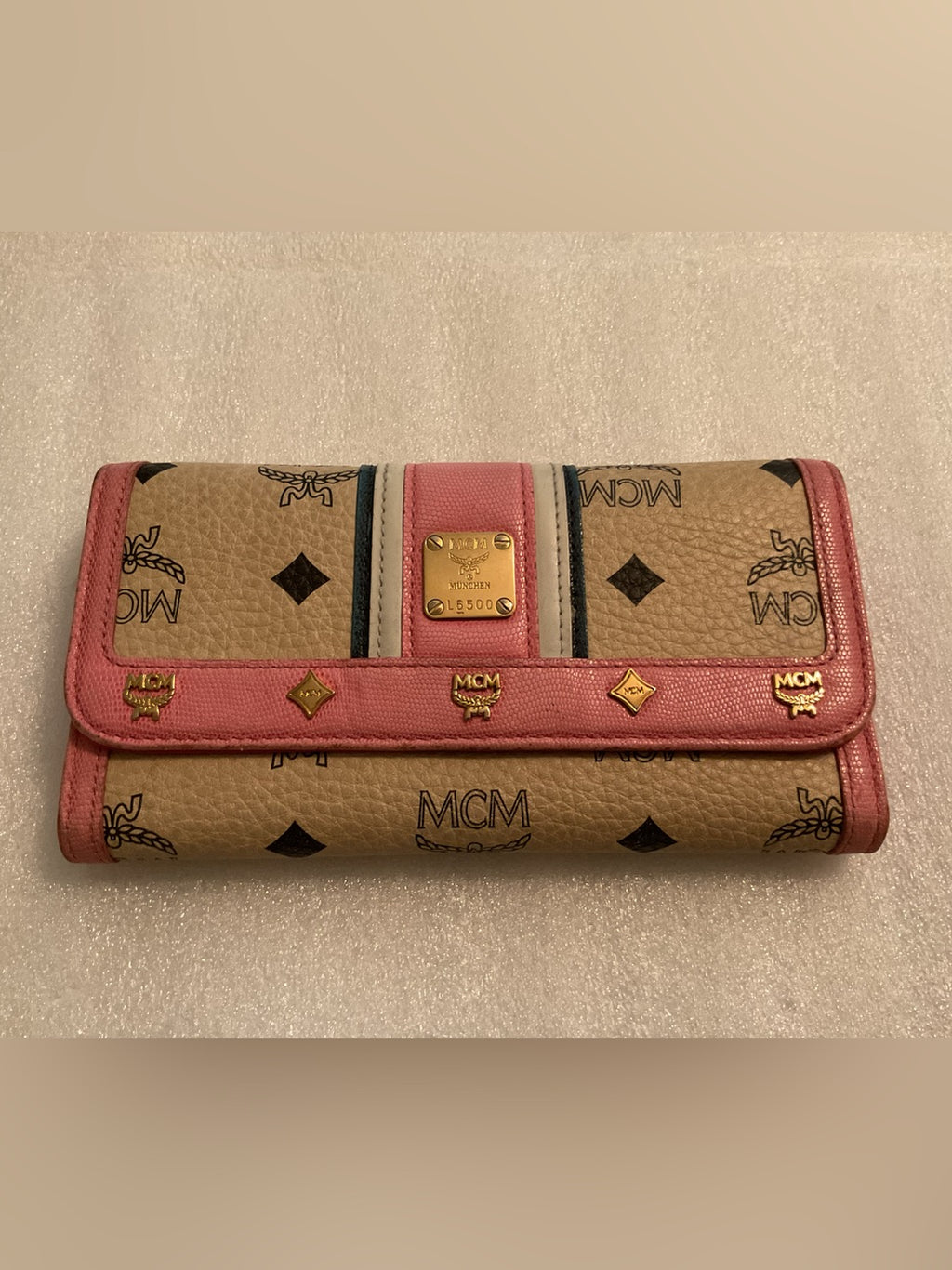 MCM Visetos continental wallet L6500 pink trim gold studs front view