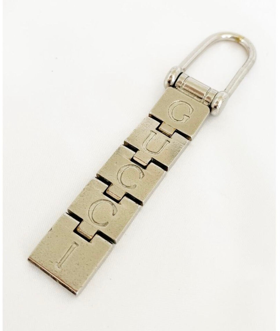 Vintage 1990s Gucci Articulated GUCCI Logo Keychain Silver Tone Made in Italy Rare