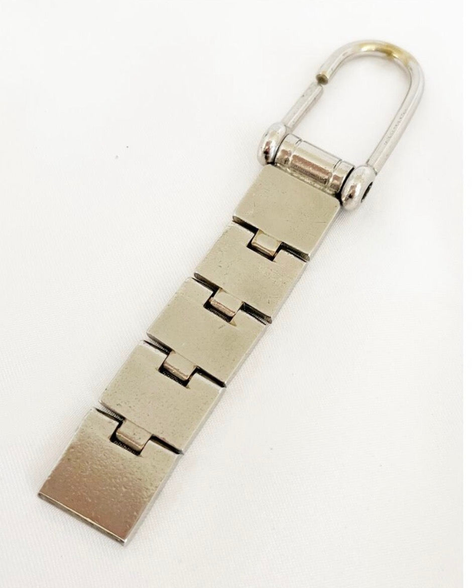 Vintage 1990s Gucci Articulated GUCCI Logo Keychain Silver Tone Made in Italy Rare
