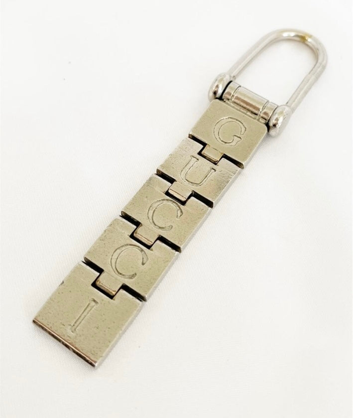Vintage 1990s Gucci Articulated GUCCI Logo Keychain Silver Tone Made in Italy Rare