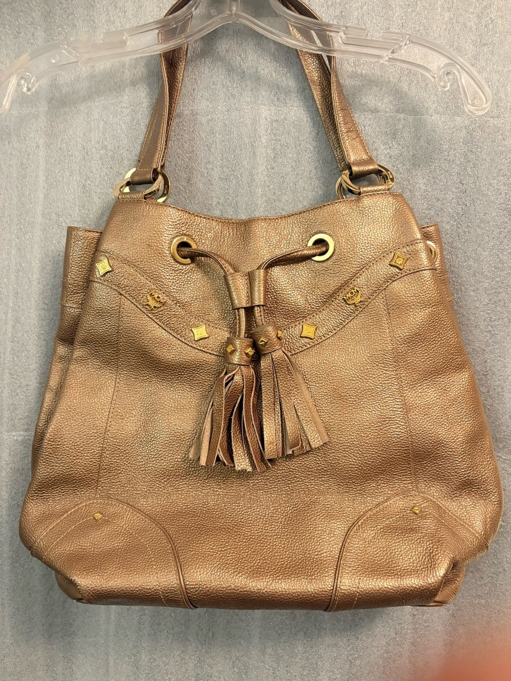 RARE Authentic MCM Metallic Bronze Pebbled Leather Drawstring Bag G0327. Korean. | listing photo 1