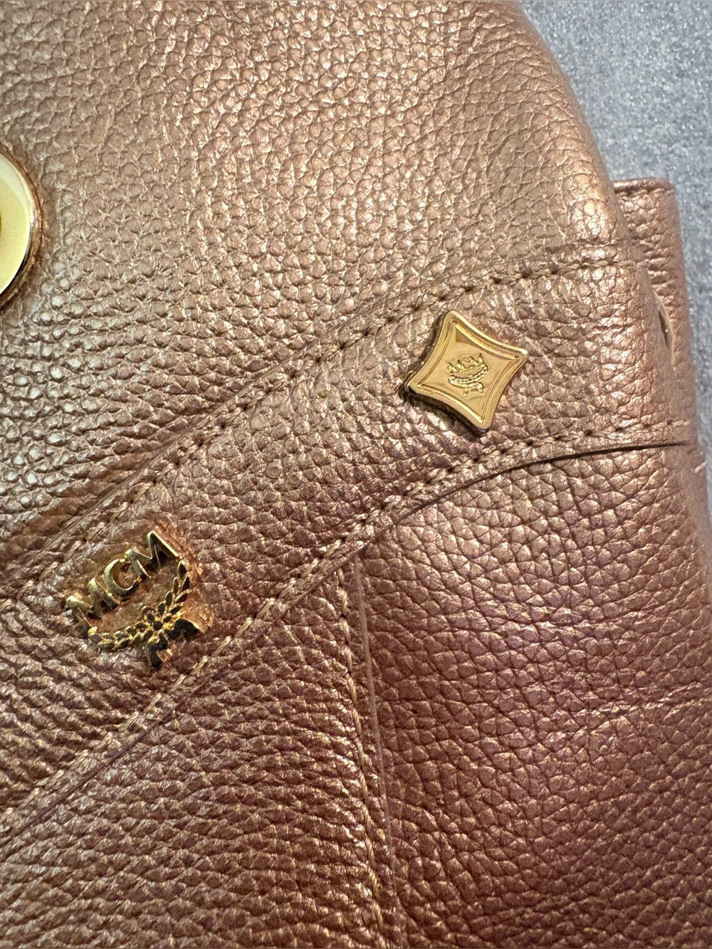 RARE Authentic MCM Metallic Bronze Pebbled Leather Drawstring Bag G0327. Korean. | listing photo 3
