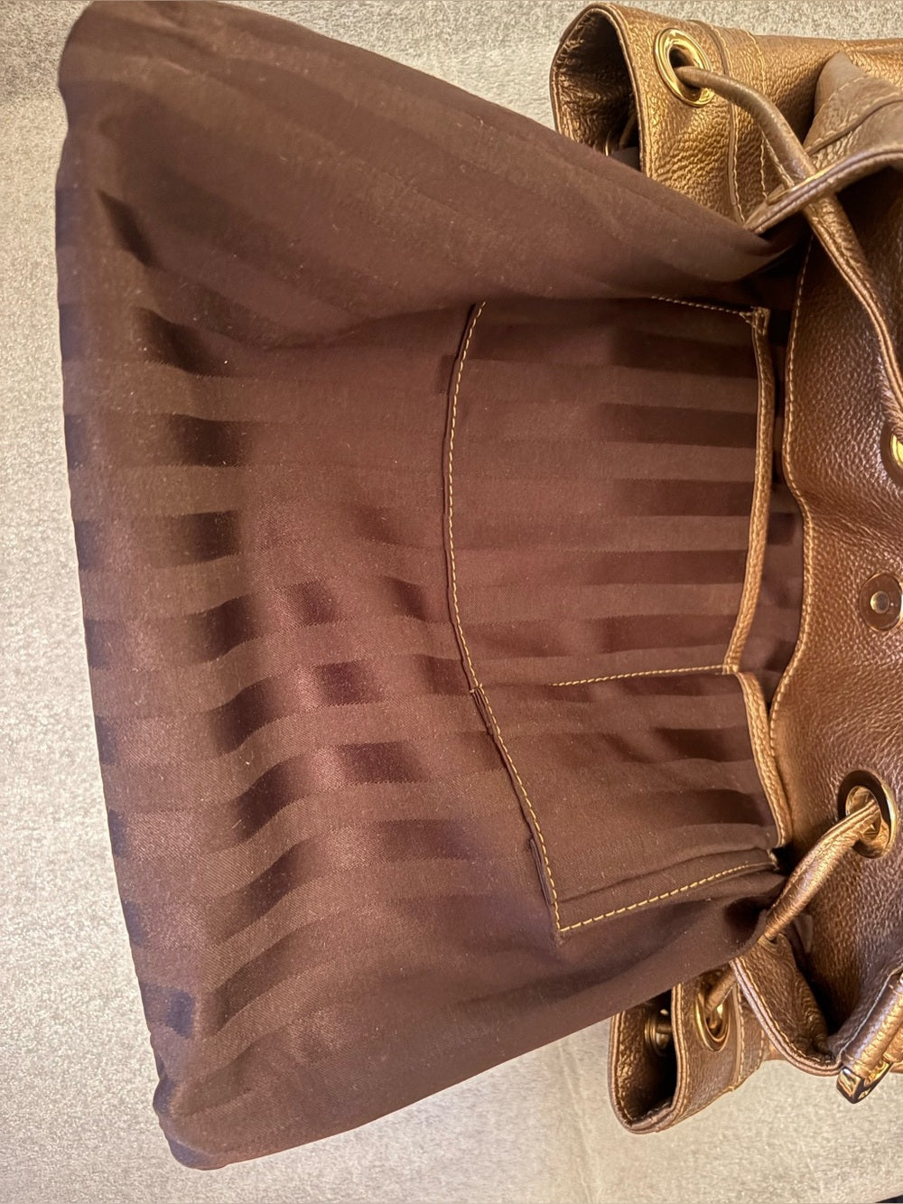 RARE Authentic MCM Metallic Bronze Pebbled Leather Drawstring Bag G0327. Korean. | listing photo 4