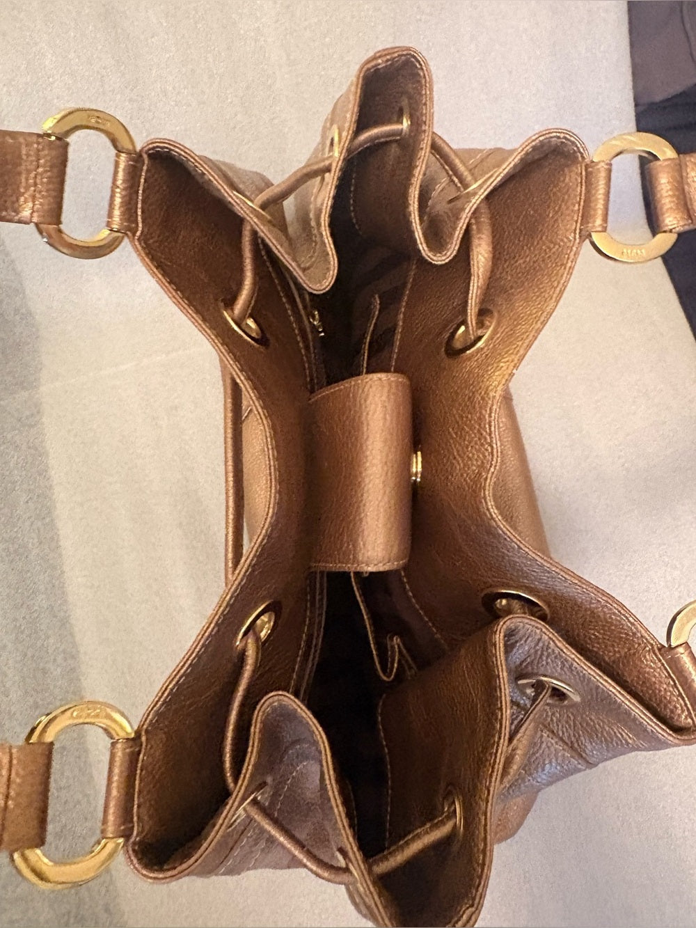RARE Authentic MCM Metallic Bronze Pebbled Leather Drawstring Bag G0327. Korean. | listing photo 5