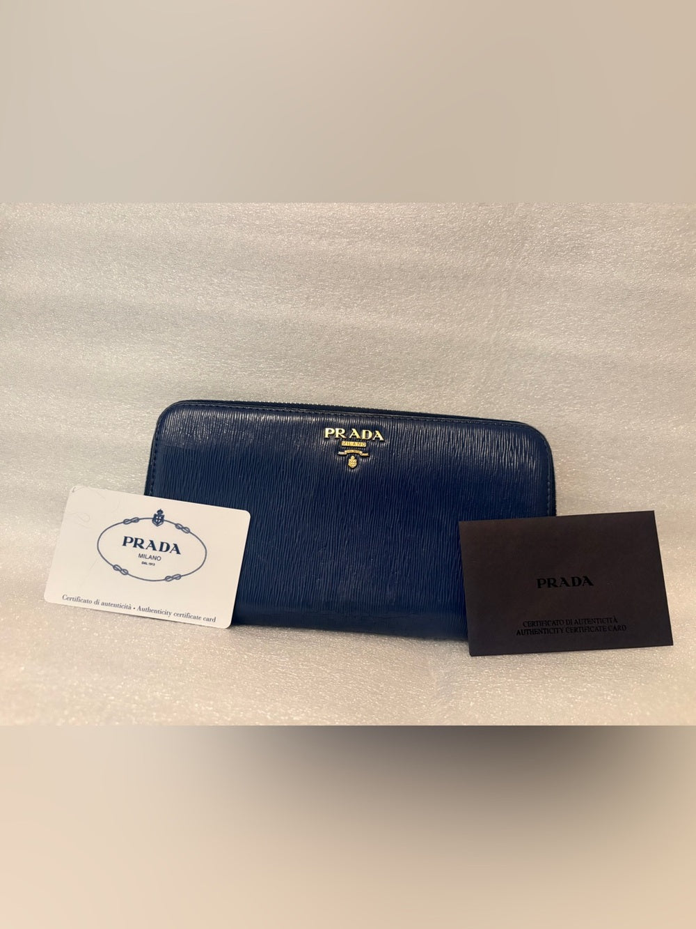 PRADA 1ML348 Vitello Move Bluette Blue Leather Continental Authenticity Card | listing photo 1